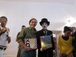 Mario with “Charlie Chaplin” holding two of Mario’s titles, at the Havana International Book Fair