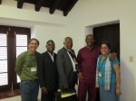 Mario enjoys a moment with members of the Saint Vincent and the Grenadines delegation to the Havana International Book Fair, Stokely Marshall, Dr. Edgar Adams, and Ambassador Dexter E. M. Rose.