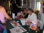 Mario and Yolanda signed copies of the book.