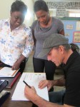 Mario signs books for the St Kitts National Museum bookstore