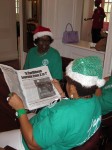 St. Croix, USVI- "Elves" read a newspaper article about Mario's book presentation at Undercover Bookstore.