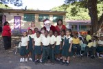Students, pose with their teacher, Santa and First Lady de Jongh.