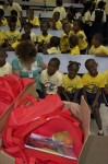 What's in the bag? A coloring book, a healthy snack and the beautiful hardcover picture book "Efa and the Mosquito" by Alscess Lewis-Brown. A gift to the children of the U.S. Virgin Islands from the Office of the Governor.